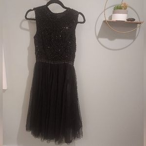 Needle and thread black sleeveless Dress. Size 4